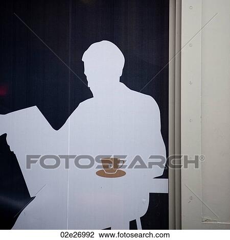 Stock Image - Silhouette of a man in cafe window in Manhattan, New York City, U. S. A.. Fotosearch