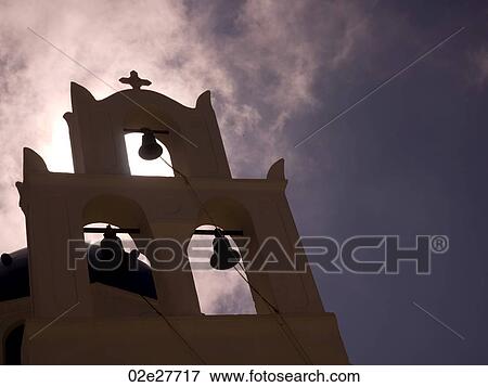 Stock Photo - Silhouette of bell tower in Santorini Greece. Fotosearch