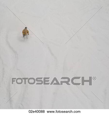 Skier on a ski slope in Vail, Colorado View Large Photo Image Stock Photo - Skier on a ski slope in Vail, Colorado. Fotosearch