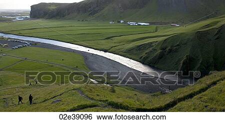 Skoga river through cliffs and farmland with hikers View Large Photo Image Stock Photograph - Skoga river through cliffs and farmland with hikers. Fotosearch