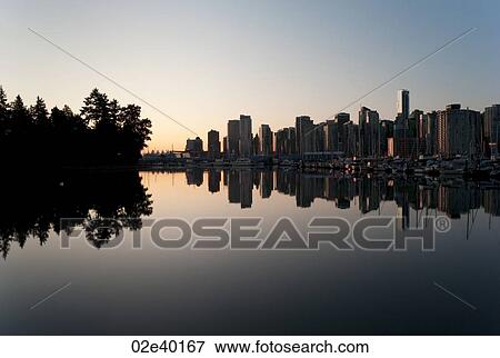 Skyline at dusk in Vancouver, British Columbia, Canada View Large Photo Image Stock Photo - Skyline at dusk in Vancouver, British Columbia, Canada. Fotosearch