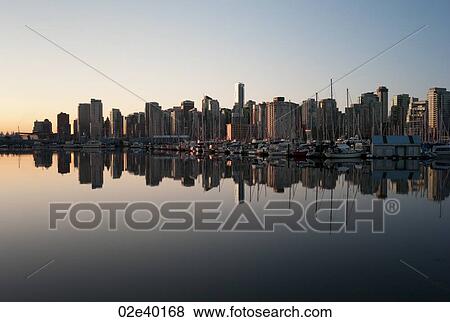 Skyline at dusk in Vancouver, British Columbia, Canada View Large Photo Image Stock Photo - Skyline at dusk in Vancouver, British Columbia, Canada. Fotosearch