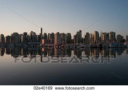 Skyline at dusk in Vancouver, British Columbia, Canada View Large Photo Image Stock Photo - Skyline at dusk in Vancouver, British Columbia, Canada. Fotosearch
