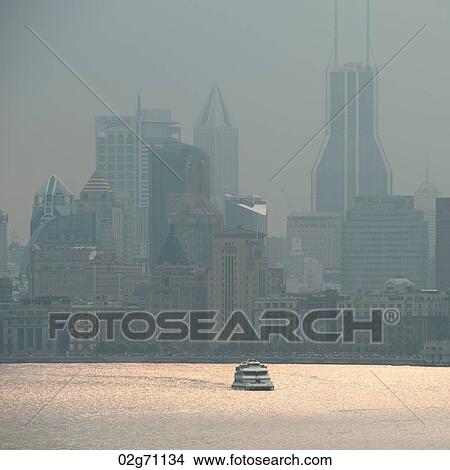 Skyscrapers at the Huangpu River waterfront, Pudong, Shanghai, China View Large Photo Image Picture - Skyscrapers at the Huangpu River waterfront, Pudong, Shanghai, China. Fotosearch