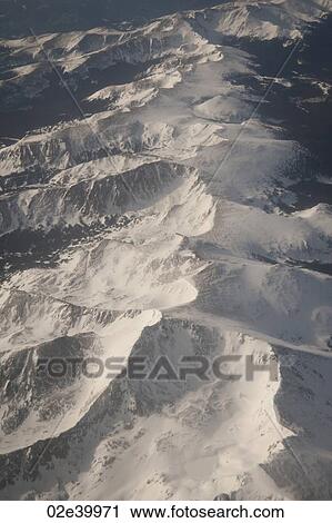 Snow on mountain peaks in Vail, Colorado View Large Photo Image Stock Image - Snow on mountain peaks in Vail, Colorado. Fotosearch
