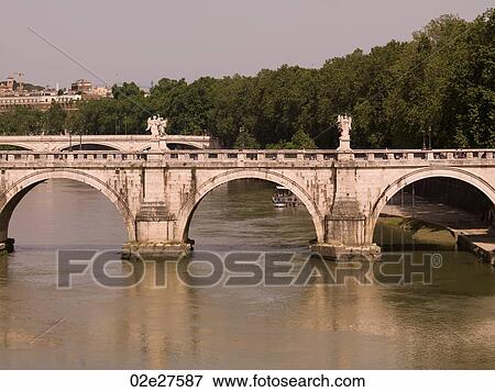 St. Angelo Bridge leading to Castel Sant'Angelo in Rome Italy View Large Photo Image Stock Photo - St. Angelo Bridge leading to Castel Sant'Angelo in Rome Italy. Fotosearch