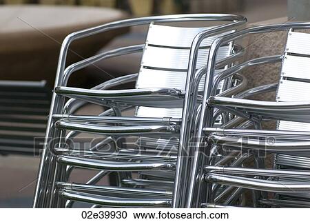 Stack of metal chairs in Rochester, Minnesota, USA View Large Photo Image Stock Image - Stack of metal chairs in Rochester, Minnesota, USA. Fotosearch