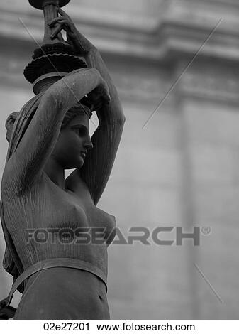 Stock Image - Statue Lamp Posts outside Palais Garnier in Paris France. Fotosearch