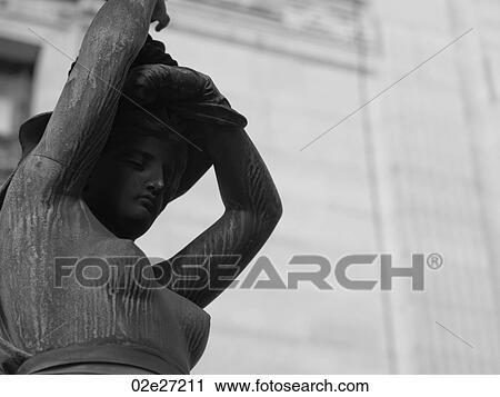 Stock Image - Statue Lamp Posts outside Palais Garnier in Paris France. Fotosearch