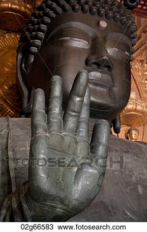 Stock Image - Statue of Buddha in Todaiji Temple, Nara, Japan. Fotosearch