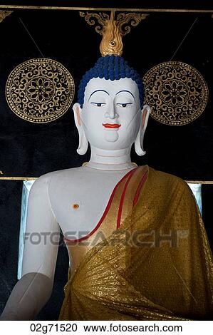 Stock Image - Statue of Buddha in Wat Chedi Luang, Chiang Mai, Thailand. Fotosearch
