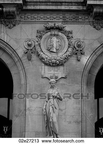 Stock Image - Statues on a building in Paris France. Fotosearch