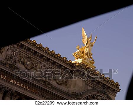 Stock Photo - Staute on Palais Garnier in Paris France. Fotosearch