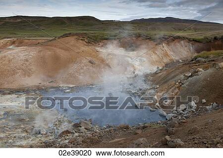 Steam rising from rocky geothermal pool View Large Photo Image Stock Image - Steam rising from rocky geothermal pool. Fotosearch