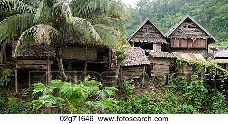 Stilt thatched roofed houses at Huay Pu Keng, Mae Hong Son Province, Thailand View Large Photo Image Stock Photograph - Stilt thatched roofed houses at Huay Pu Keng, Mae Hong Son Province, Thailand. Fotosearch