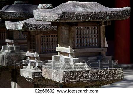 Stock Image - Stone lanterns at Kasuga Taisha Shrine, Nara, Japan. Fotosearch