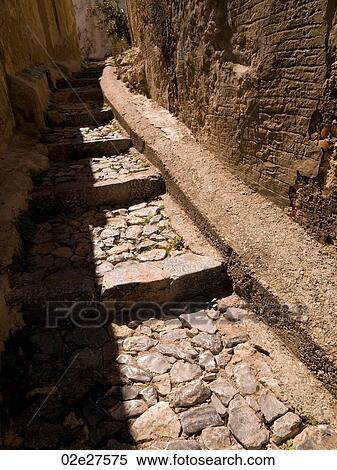 Stock Photography - Stone pathway in Rhodes Greece. Fotosearch