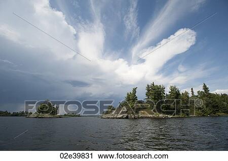 Storm clouds in the horizon sky at Lake of the Woods, Ontario View Large Photo Image Stock Image - Storm clouds in the horizon sky at Lake of the Woods, Ontario. Fotosearch
