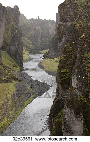 Stream at the bottom of a revine in Iceland View Large Photo Image Stock Image - Stream at the bottom of a revine in Iceland. Fotosearch