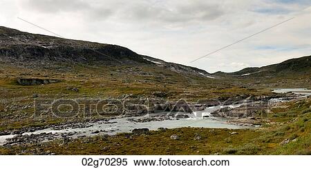 Stream flowing through a landscape, Norway View Large Photo Image Stock Photography - Stream flowing through a landscape, Norway. Fotosearch