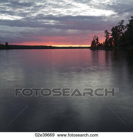 Sunset at Lake of the Woods, Ontario View Large Photo Image Stock Photo - Sunset at Lake of the Woods, Ontario. Fotosearch