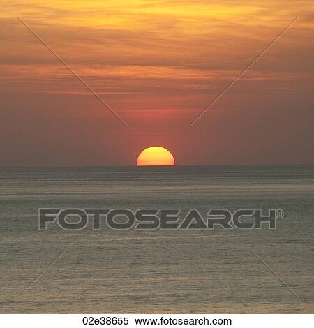 Sunset over Costa Rica coastal waters View Large Photo Image Stock Photography - Sunset over Costa Rica coastal waters. Fotosearch