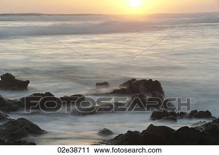 Stock Image - Sunset seascape in San Jose Costa Rica. Fotosearch