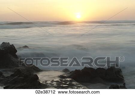 Stock Image - Sunset seascape in San Jose Costa Rica. Fotosearch