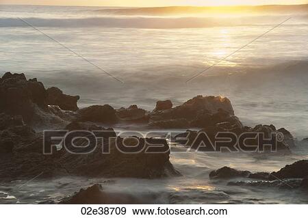 Stock Photo - Sunset seascape in San Jose Costa Rica. Fotosearch
