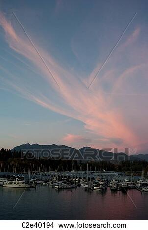 Sunset skyline and boats docked in Vancouver, British Columbia, Canada View Large Photo Image Picture - Sunset skyline and boats docked in Vancouver, British Columbia, Canada. Fotosearch
