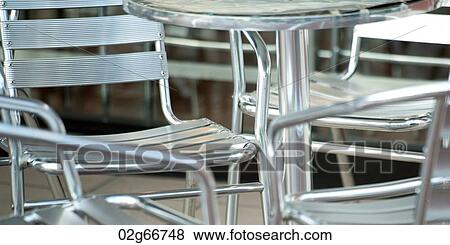 Table and chairs at a cafe, Tokyo, Japan View Large Photo Image Stock Photo - Table and chairs at a cafe, Tokyo, Japan. Fotosearch