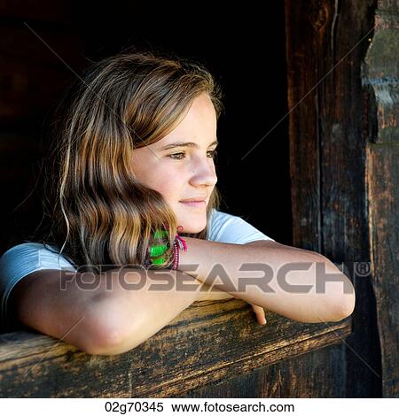 Stock Photography - Teenage girl in Norsk Folkemuseum, Oslo, Norway. Fotosearch