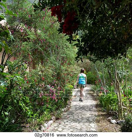 Teenage girl walking in the garden of Willka Tika Guesthouse, Willka Tika, Sacred Valley, Cusco Region, Peru View Large Photo Image Stock Photograph - Teenage girl walking in the garden of Willka Tika Guesthouse, Willka Tika, Sacred Valley, Cusco Region, Peru. Fotosearch