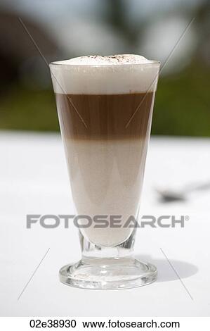 Three layer frothy coffee in a glass mug View Large Photo Image Stock Image - Three layer frothy coffee in a glass mug. Fotosearch