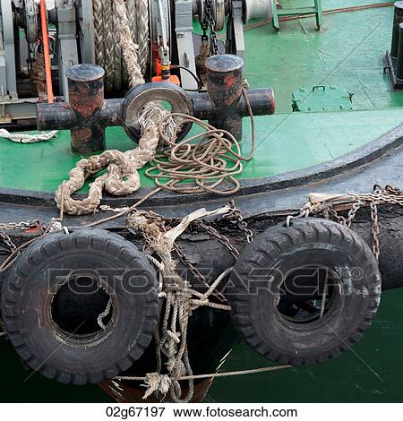 Stock Photo - Tires and rope on a boat, Busan, Yeongnam, South Korea. Fotosearch