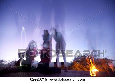 Tourists around a campfire in Kenya Africa View Large Photo Image Stock Photo - Tourists around a campfire in Kenya Africa. Fotosearch