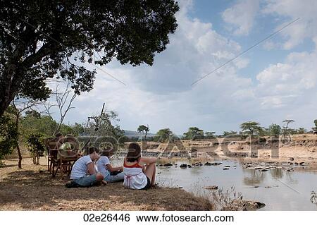 Tourists in Kenya View Large Photo Image Stock Photograph - Tourists in Kenya. Fotosearch