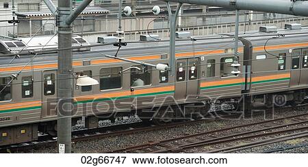 Train moving on tracks, Tokyo, Japan View Large Photo Image Stock Photo - Train moving on tracks, Tokyo, Japan. Fotosearch