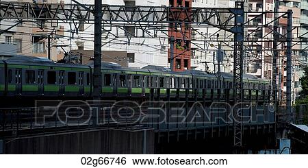 Train moving on tracks, Tokyo, Japan View Large Photo Image Stock Photograph - Train moving on tracks, Tokyo, Japan. Fotosearch