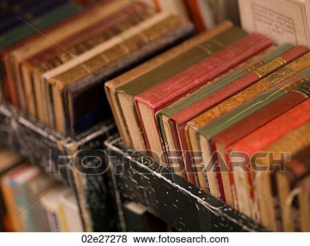 Trolley of books View Large Photo Image Stock Photo - Trolley of books. Fotosearch