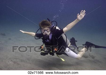 Stock Photograph - Underwater photography, scuba diver. Fotosearch