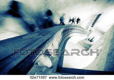 Stock Photo - View down a curved staircase. Fotosearch
