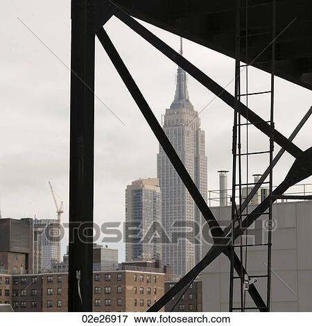 View of the Empire State Building from Chelsea district in Manhattan, New York City, U. S. A. View Large Photo Image Stock Photo - View of the Empire State Building from Chelsea district in Manhattan, New York City, U. S. A.. Fotosearch