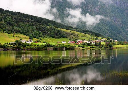Village at waterfront, Granvinsvatnet, Granvin, Hordaland County, Norway View Large Photo Image Stock Photo - Village at waterfront, Granvinsvatnet, Granvin, Hordaland County, Norway. Fotosearch