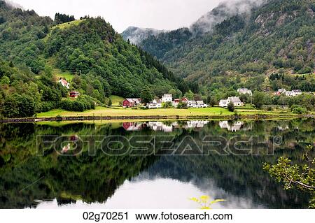 Village at waterfront in a valley, Bjorn Fjord, Hardangervidda, Hardanger, Norway View Large Photo Image Stock Image - Village at waterfront in a valley, Bjorn Fjord, Hardangervidda, Hardanger, Norway. Fotosearch