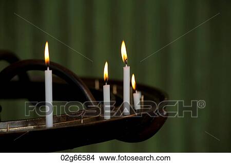Picture - Votive candles burning in Todaiji Temple, Nara, Japan. Fotosearch