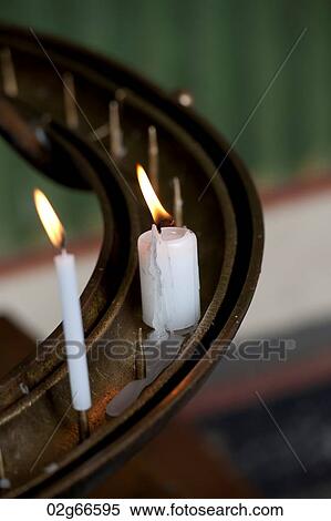 Stock Photography - Votive candles burning in Todaiji Temple, Nara, Japan. Fotosearch