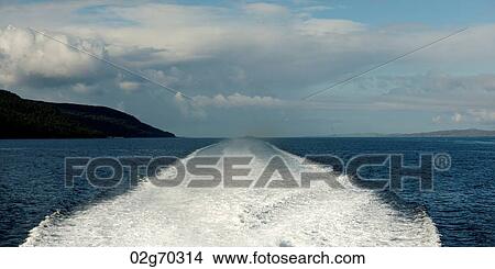 Wake in a Fjord made from a moving boat, Sognefjord, Norway View Large Photo Image Picture - Wake in a Fjord made from a moving boat, Sognefjord, Norway. Fotosearch