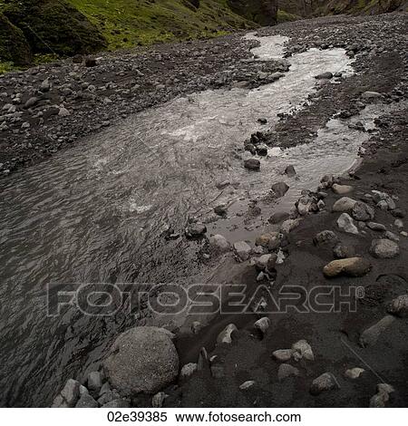 Water runoff in rocky riverbed View Large Photo Image Stock Photography - Water runoff in rocky riverbed. Fotosearch