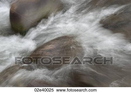 Water splashing on rocks in Vail, Colorado View Large Photo Image Stock Photography - Water splashing on rocks in Vail, Colorado. Fotosearch